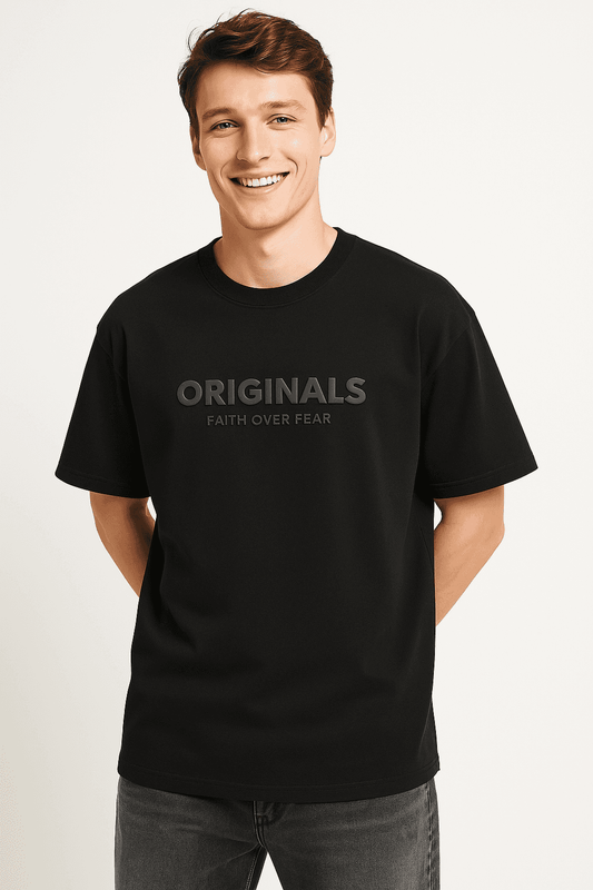 Men’s oversized black t-shirt featuring 'Originals Faith Over Fear' 3D print, ideal for minimalist streetwear and casual comfort.
