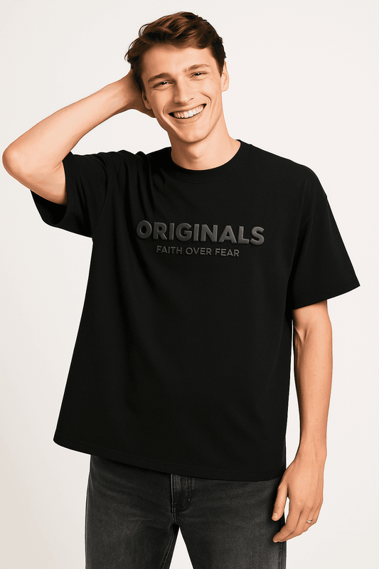 Originals Faith Over Fear - Oversized Streetwear Tee in black with 3D graphic text, made from organic cotton for sustainable fashion.