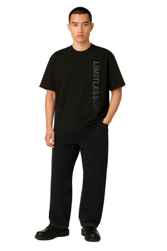 Infinite Limitless Men's Streetwear T-Shirt in black with 3D embossed 'LIMITLESS' text, styled oversized for a modern streetwear look.
