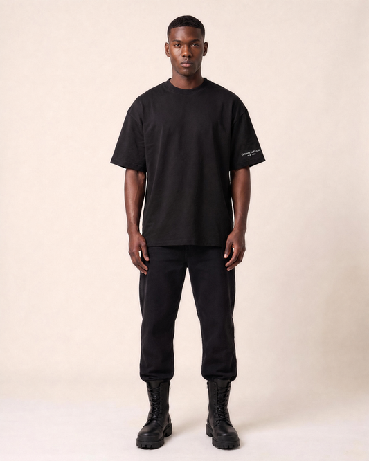 Men's NY Ain't for Everybody in black – full-length front view, oversized fit styled with black pants and boots – Grind n Flow