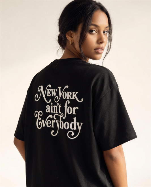 Model looking over her shoulder showing the back print