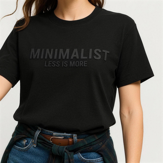Minimalist Tee in black – close-up of the tonal MINIMALIST chest print – Grind n Flow