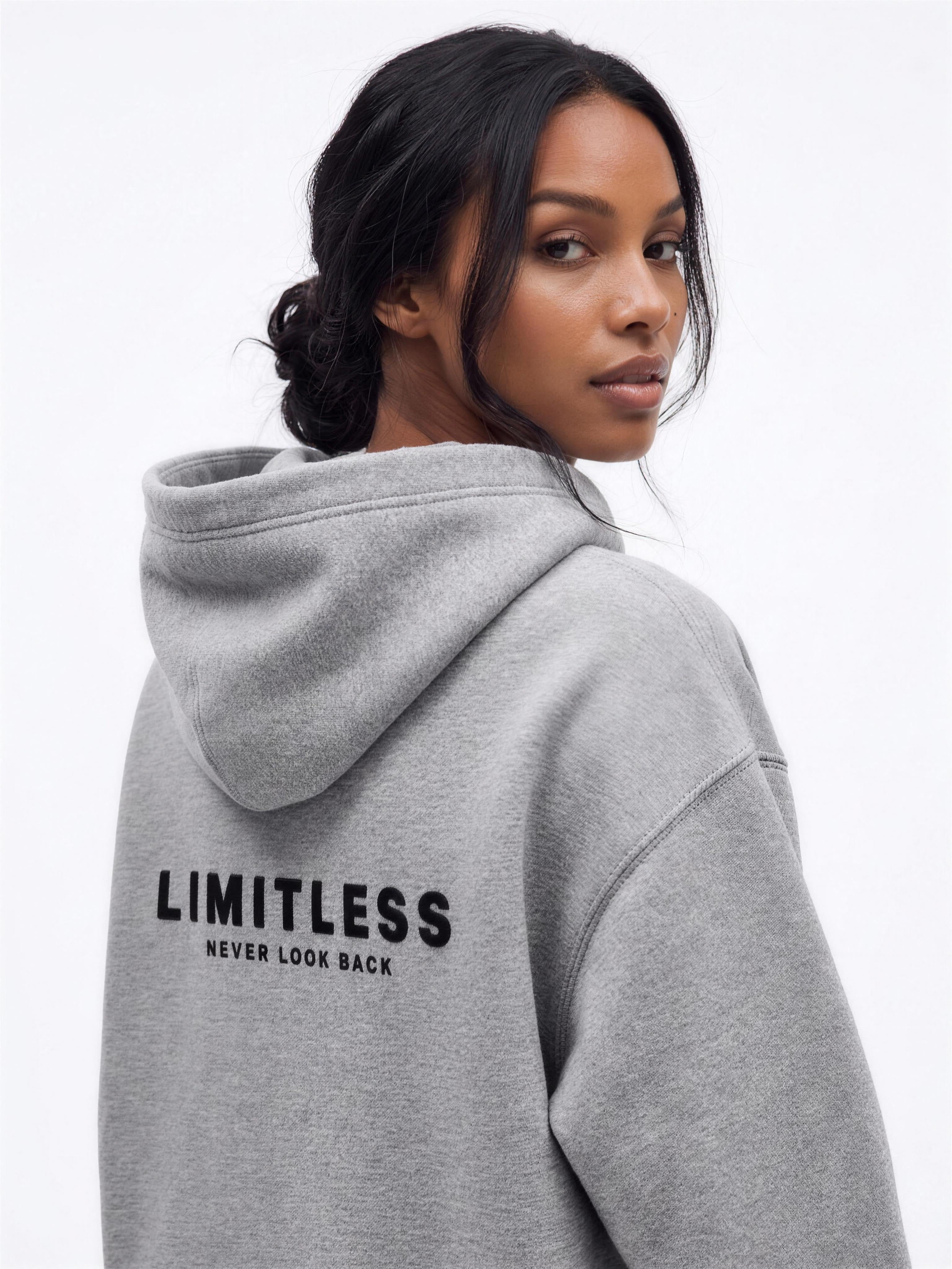 LIMITLESS Fleece Hoodie (Heather Grey) - over the shoulder, back print - Grind n Flow